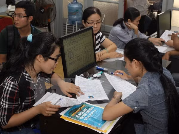Ngành giáo dục đang có nhiều nỗ lực cải cách hành chính. ảnh minh họa: TTXVN.