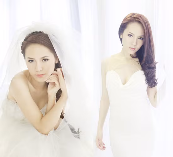 Trong bộ váy cưới màu trắng Phương Linh đẹp dịu dàng mà vẫn vô cùng gợi cảm. Từ ánh mắt, bờ môi đều toát lên sức cuốn hút lạ kì.