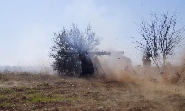 Phiến quân Syria chiến đấu tại Hama. Phiến quân Syria chiến đấu tại Hama.