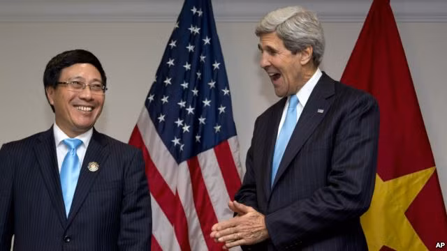 Phó Thủ tướng kiêm Bộ trưởng Ngoại giao Phạm Bình Minh và Ngoại trưởng Mỹ John Kerry.