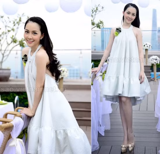 Chiếc váy trắng cổ yếm thiết kế xoè bồng bềnh khơi lên vẻ đẹp tinh khôi sang trọng của Linh Nga Chiếc váy trắng cổ yếm thiết kế xoè bồng bềnh khơi lên vẻ đẹp tinh khôi sang trọng của Linh Nga