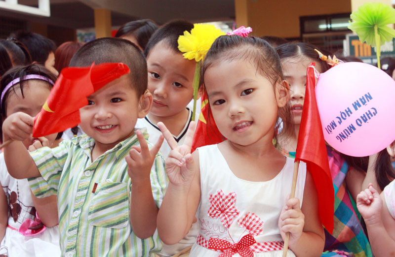 Học sinh trường PTCS Xã Đàn (Hà Nội) khai giảng năm học 2011-2012. Ảnh: Giàng A Cối