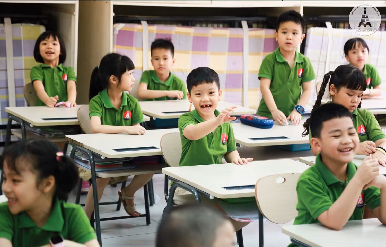 Theo dự thảo Điều lệ trường tiểu học, giáo viên tiểu học được trao quyền mới là “tự chủ thực hiện nhiệm vụ chuyên môn với sự hỗ trợ của tổ chuyên môn và nhà trường”. (Ảnh: trường Marie Curie)