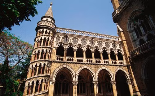9. Đại học Mumbai (Ấn Độ) được xây dựng từ thế kỷ 19. Trường bao gồm nhiều tòa nhà rất đẹp, trong đó có một cầu thang xoắn ốc. 9. Đại học Mumbai (Ấn Độ) được xây dựng từ thế kỷ 19. Trường bao gồm nhiều tòa nhà rất đẹp, trong đó có một cầu thang xoắn ốc.
