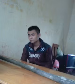 Đối tượng Lô Thành Sinh sau khi bị bắt