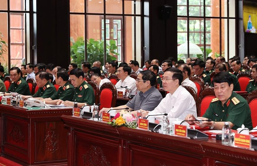 Thủ tướng Phạm Minh Chính; Thường trực Ban Bí thư Võ Văn Thưởng; Đại tướng Phan Văn Giang, Bộ trưởng Bộ Quốc phòng; Đại tướng Lương Cường, Chủ nhiệm Tổng cục Chính trị Quân đội nhân dân Việt Nam và các đại biểu dự hội nghị. (Ảnh: Dương Giang/TTXVN) Thủ tướng Phạm Minh Chính; Thường trực Ban Bí thư Võ Văn Thưởng; Đại tướng Phan Văn Giang, Bộ trưởng Bộ Quốc phòng; Đại tướng Lương Cường, Chủ nhiệm Tổng cục Chính trị Quân đội nhân dân Việt Nam và các đại biểu dự hội nghị. (Ảnh: Dương Giang/TTXVN)