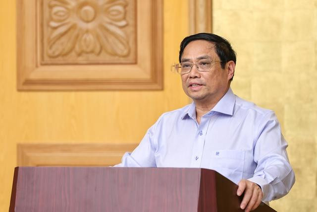 Thủ tướng phát biểu khai mạc cuộc thảo luận về điều hành kinh tế vĩ mô - Ảnh: VGP/Nhật Bắc