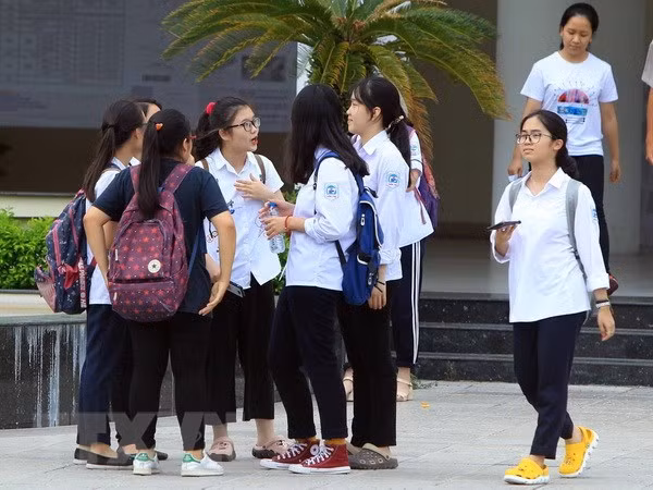 Kết thúc ngày thi thứ nhất, có 18 thí sinh không tới được điểm thi vì mưa bão (Ảnh minh họa: TTXVN)
