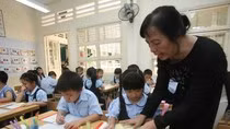 Thay chấm điểm bằng nhận xét học sinh tiểu học dù là một chủ trương đúng (Ảnh: thanhnien.vn).