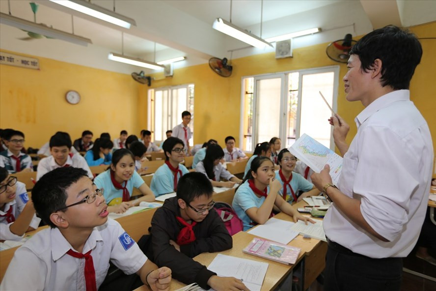 Làm thế nào để giảm áp lực cho giáo viên? Ảnh minh hoạ: Laodong.vn