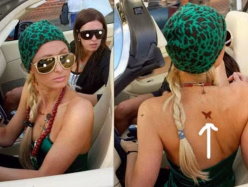Hình xăm con bướm trên bả vai trái của Paris Hilton. Hình xăm con bướm trên bả vai trái của Paris Hilton.