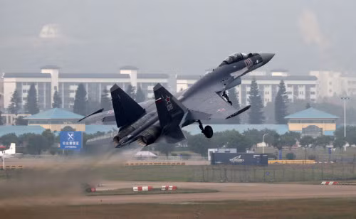 Máy bay chiến đấu Su-35 bay biểu diễn ở Triển lãm hàng không Chu Hải 2014 Trung Quốc Máy bay chiến đấu Su-35 bay biểu diễn ở Triển lãm hàng không Chu Hải 2014 Trung Quốc