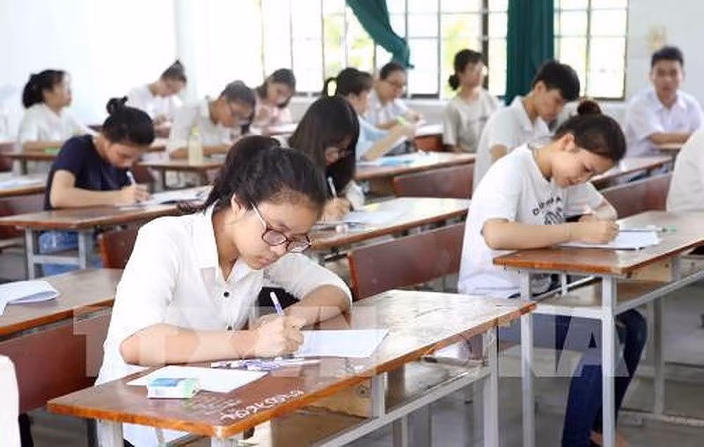 Nên giữ hay bỏ thi tốt nghiệp trung học phổ thông (Ảnh minh họa: TTXVN).